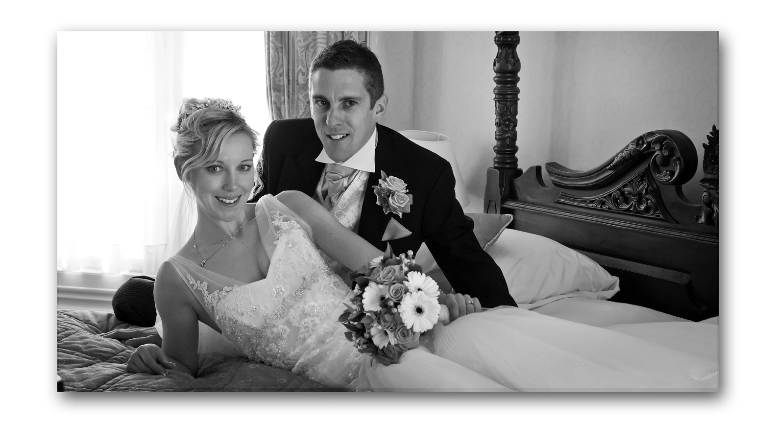 black and white wedding photo of bride and goom